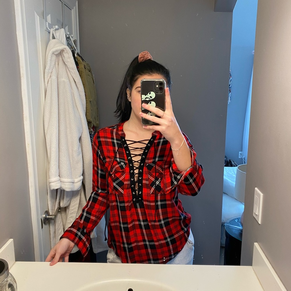 Red, black, and white tie up flannel